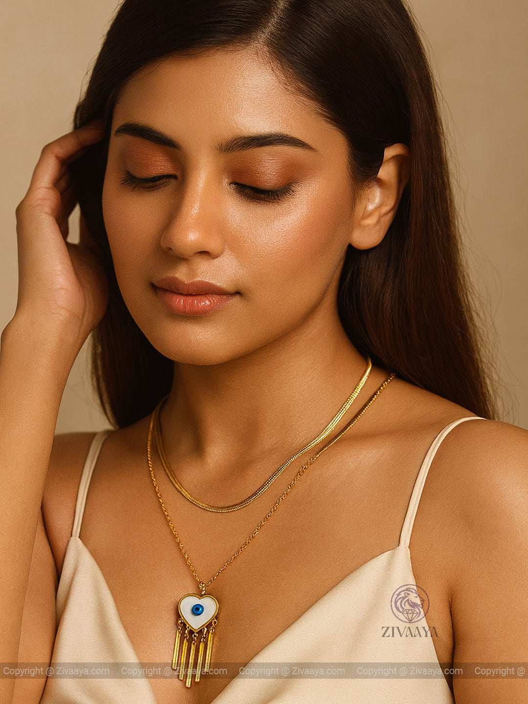 Layered gold chain featuring Evil Eye and heart - Zivaaya