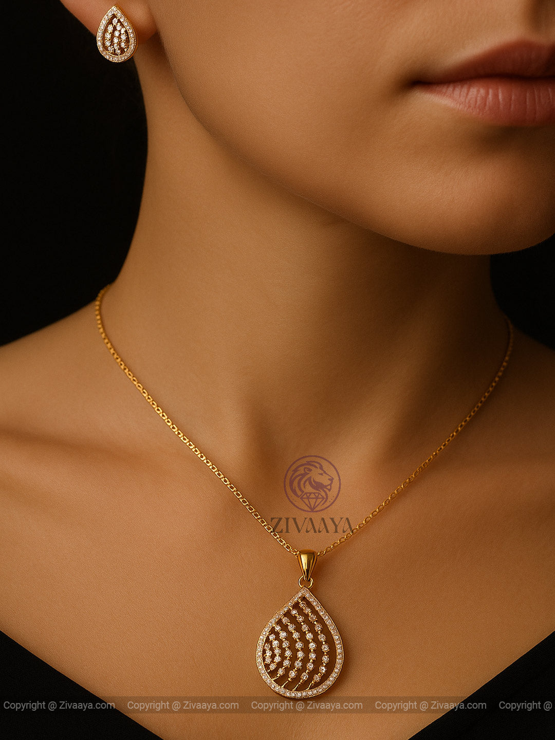 Elegant Golden Teardrop Pendant with Matching Earrings with  Sparkling AD Stones